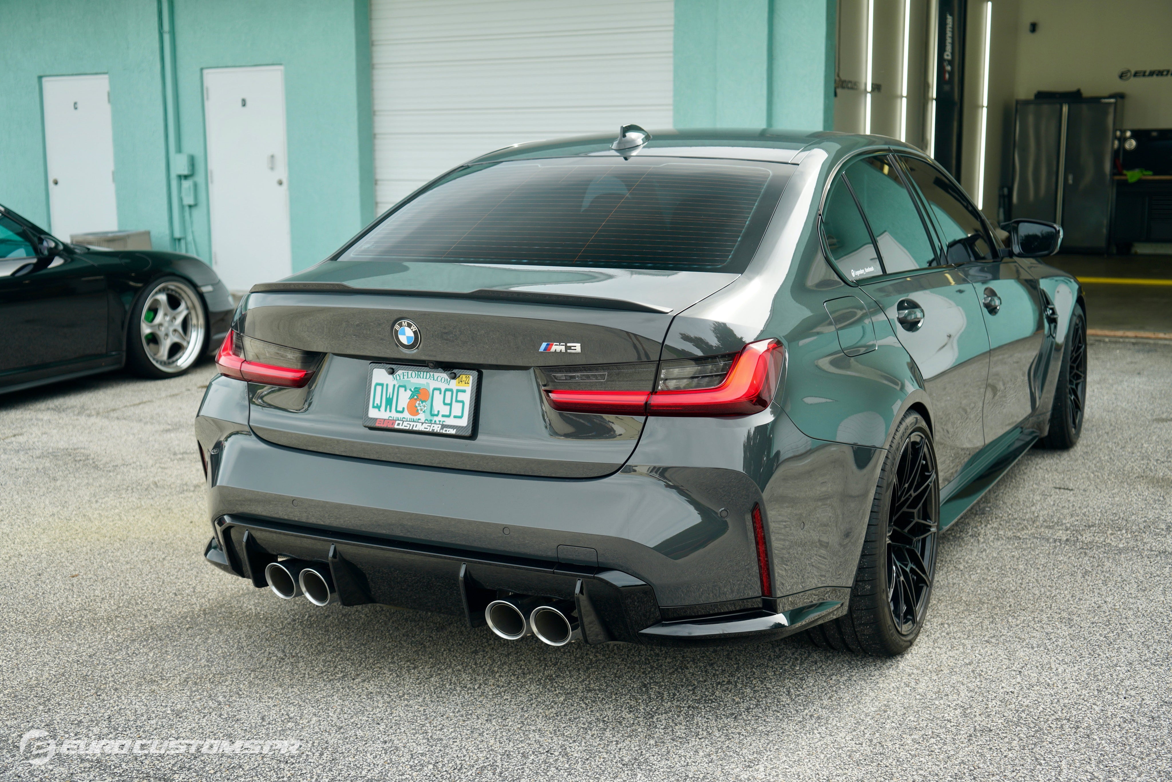 BMW G80 M3 lowered on H&R 28616-1 Sport Springs, rear view