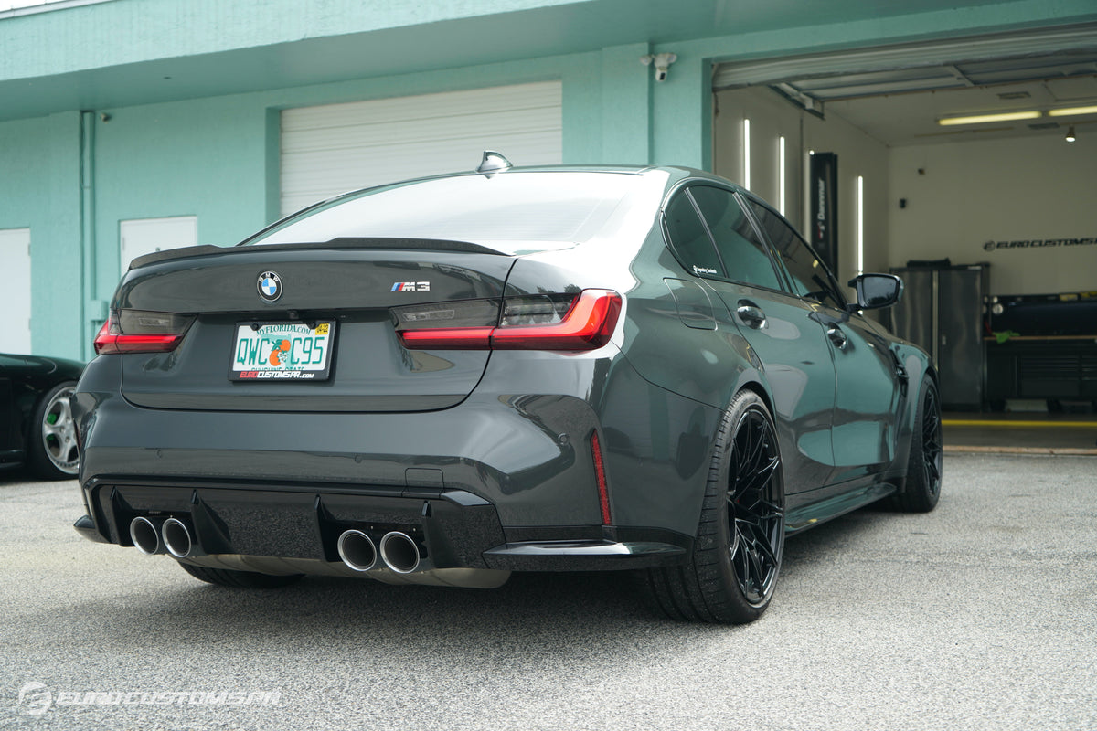 BMW G80 M3 with H&R Sport Springs installed, rear three-quarter view