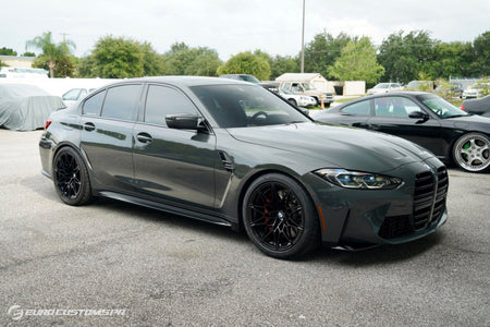 BMW G80 M3 with H&R 28616-1 Sport Springs installed, front three-quarter view