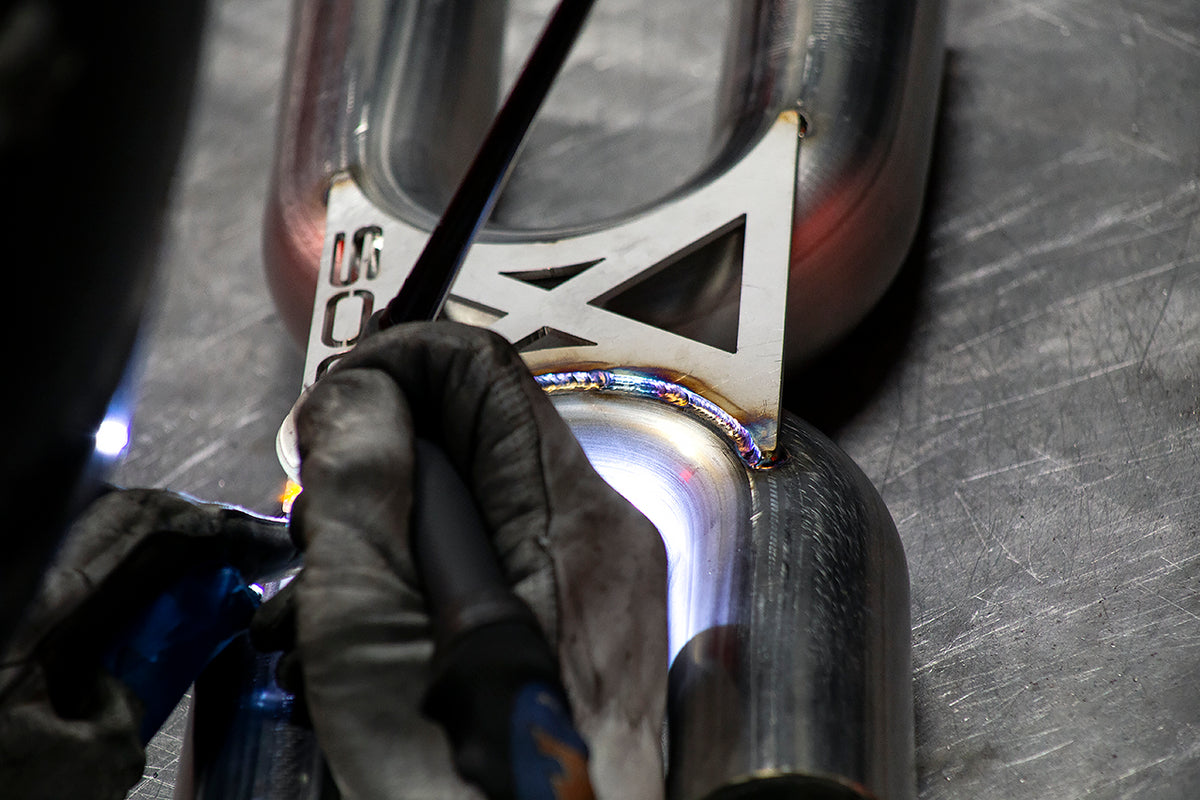 SOUL-997.2-Carrera-Center-Muffler-Development-Bracket-2-1.jpg