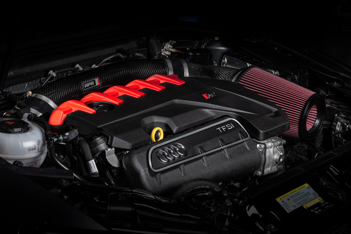 APR carbon fiber intake and open filter installed in an Audi TT RS engine bay