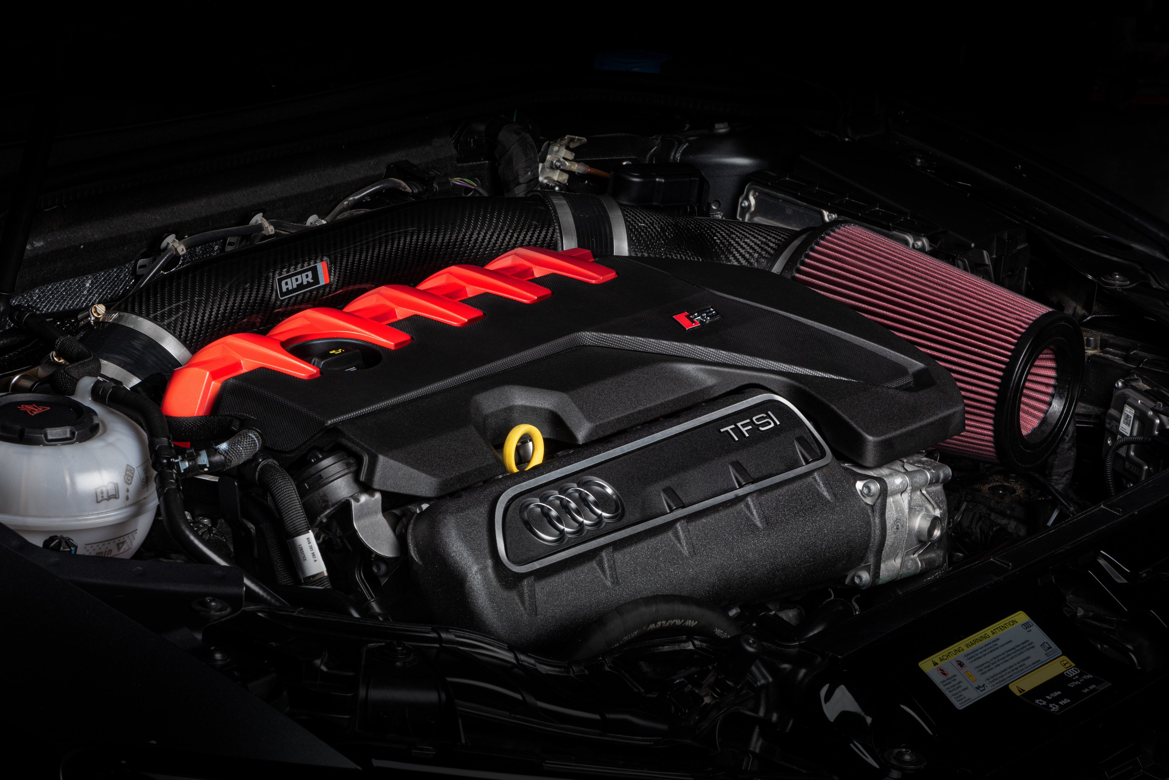 APR carbon fiber intake and open filter installed in an Audi TT RS engine bay
