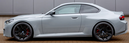 BMW G87 M2 with H&R 28616-7 lowering springs side profile