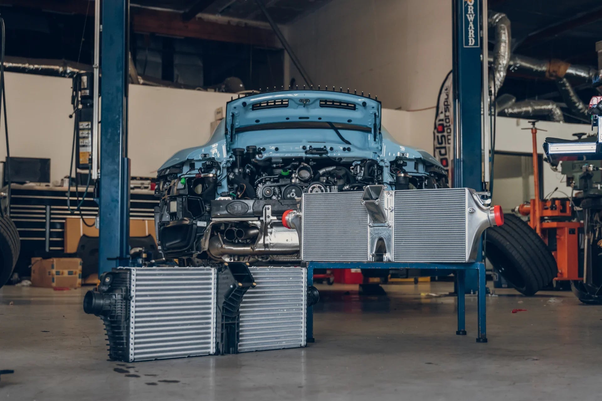 CSF 8188 and original intercooler comparison during Porsche 992 installation