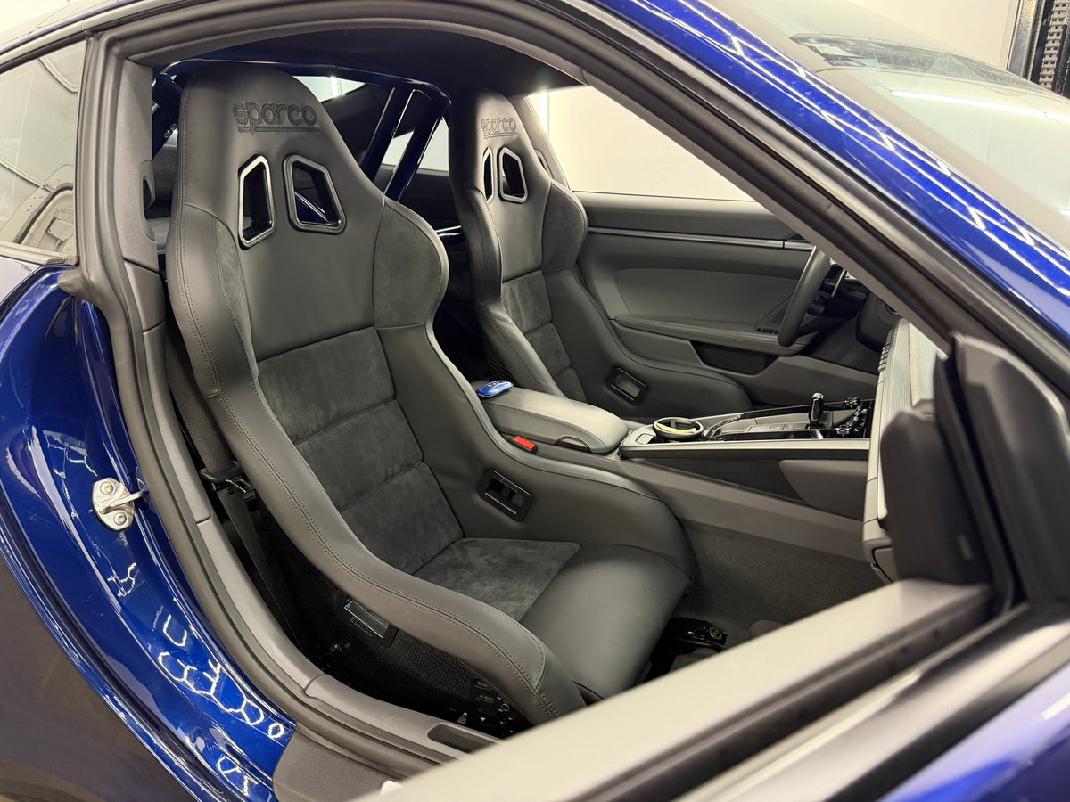 Pair of Sparco EVO Performance carbon fiber seats installed in a Porsche 992
