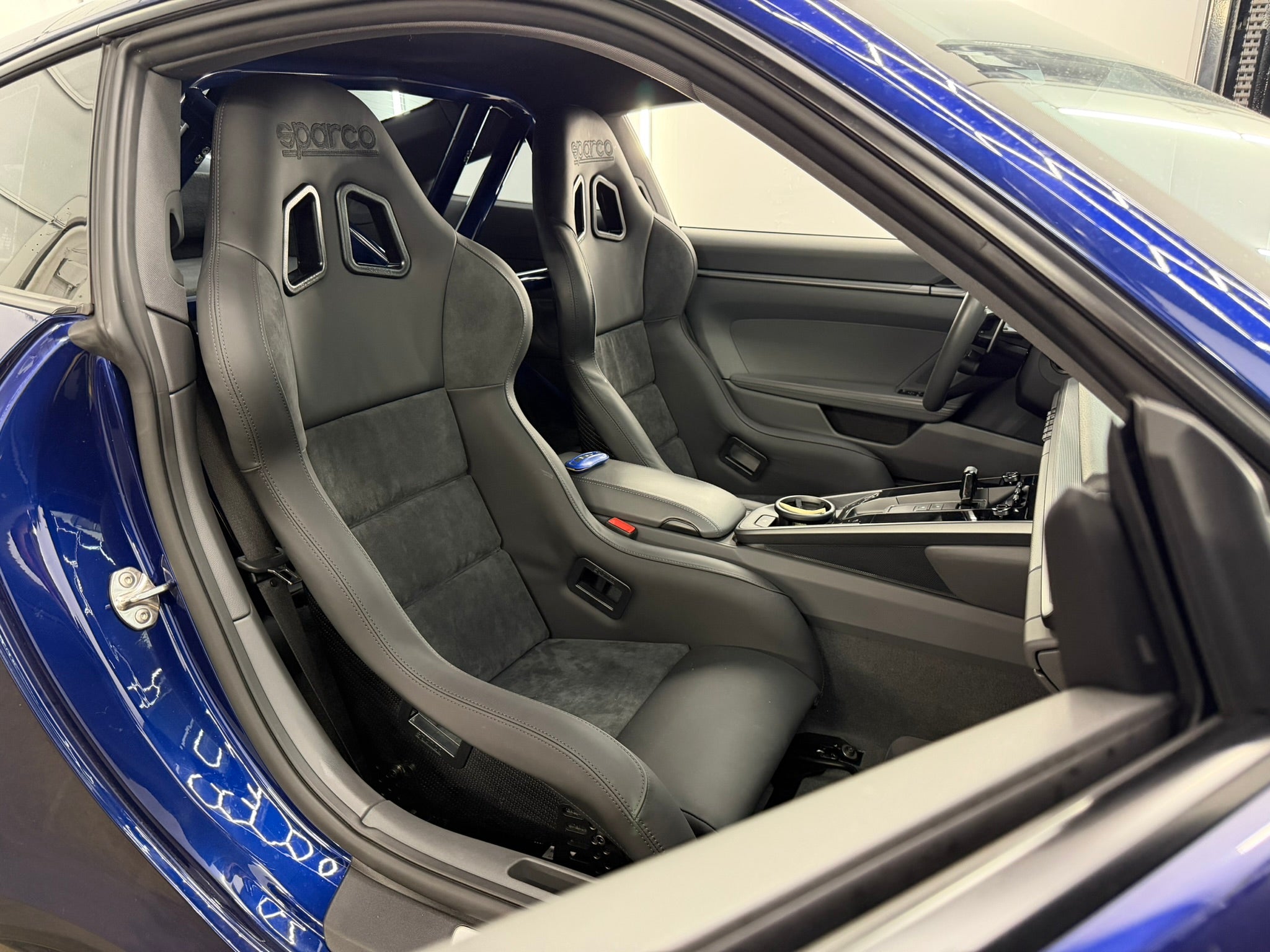 Pair of Sparco EVO Performance carbon fiber seats installed in a Porsche 992