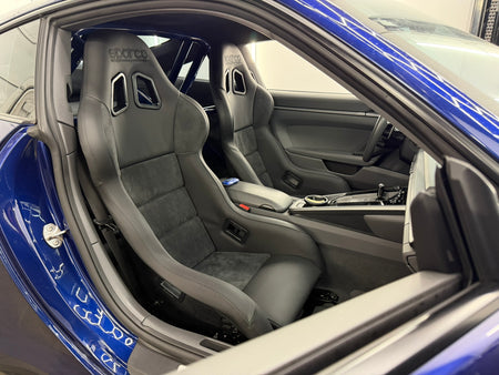 Pair of Sparco EVO Performance carbon fiber seats installed in a Porsche 992