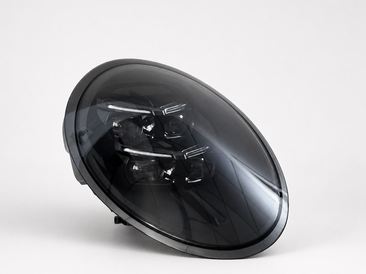 Porsche 991 HD Matrix-style headlight with black housing and lights switched off