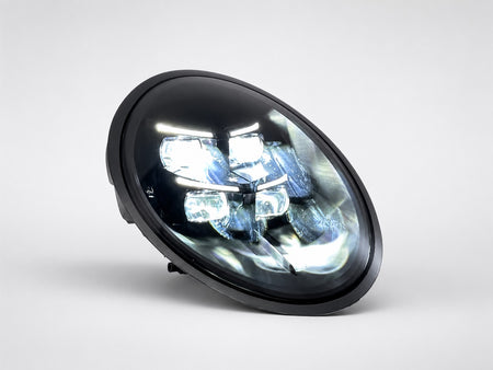 Porsche 991 HD Matrix-style headlight with white DRLs and LED projectors illuminated