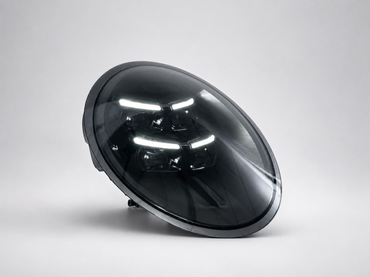 Porsche 991 HD Matrix-style headlight with four white daytime running light bars
